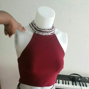 2 piece racer back crop top with a line skirt.